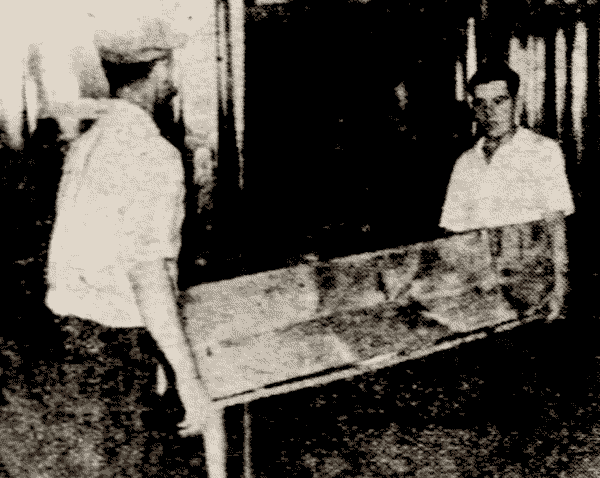 Pinzolo remains carried from Brokaw building - New York Daily News photo