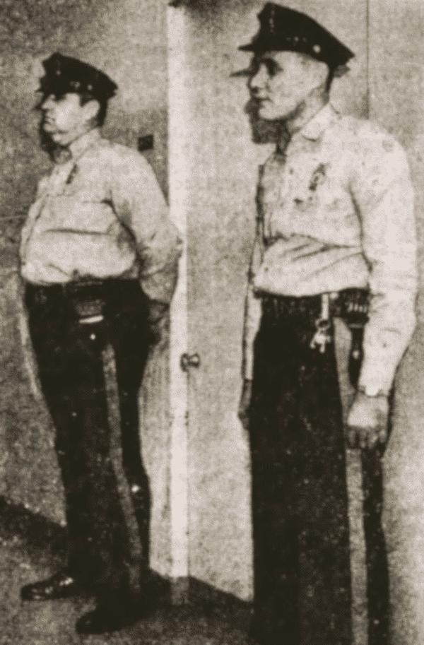 Guards outside hospital room