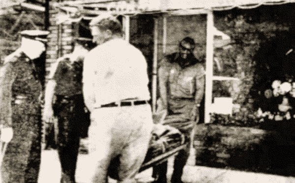 Police remove Santantonio's body from flower shop